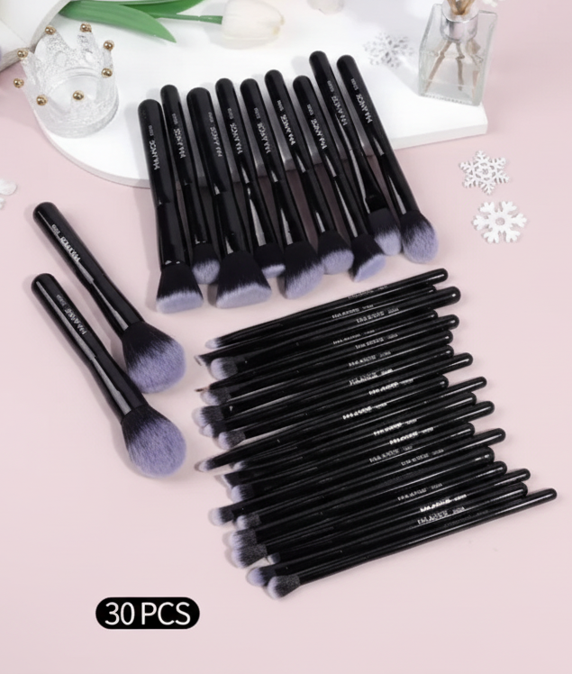 Makeup brush set with light pink background