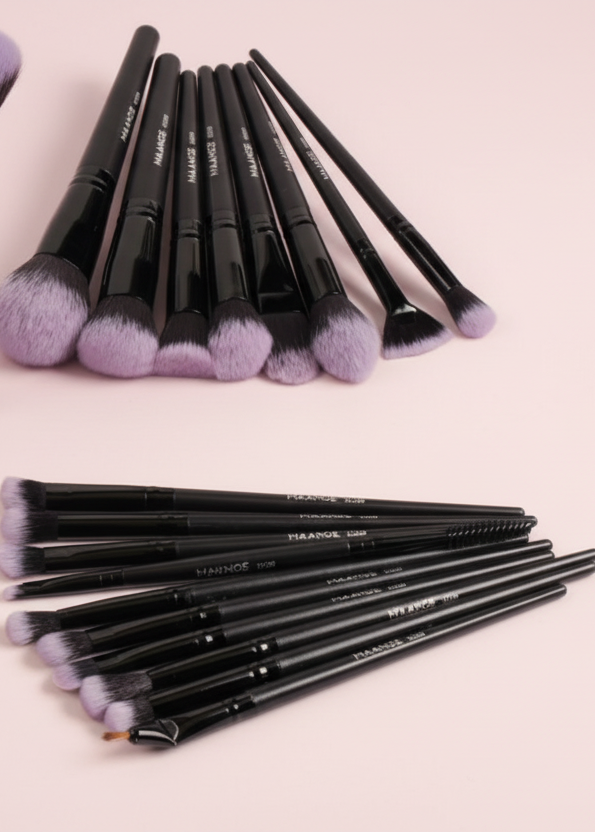 Brush arrangement with light pink background
