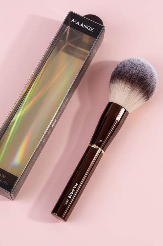 MAANCE brush with holographic box on soft pink background