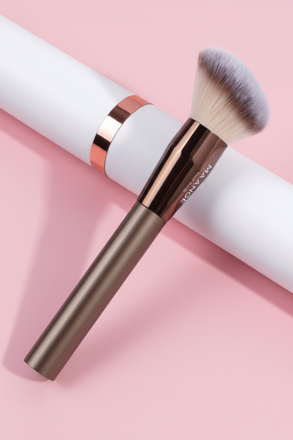 MAANGE contour brush with white container on soft pink background