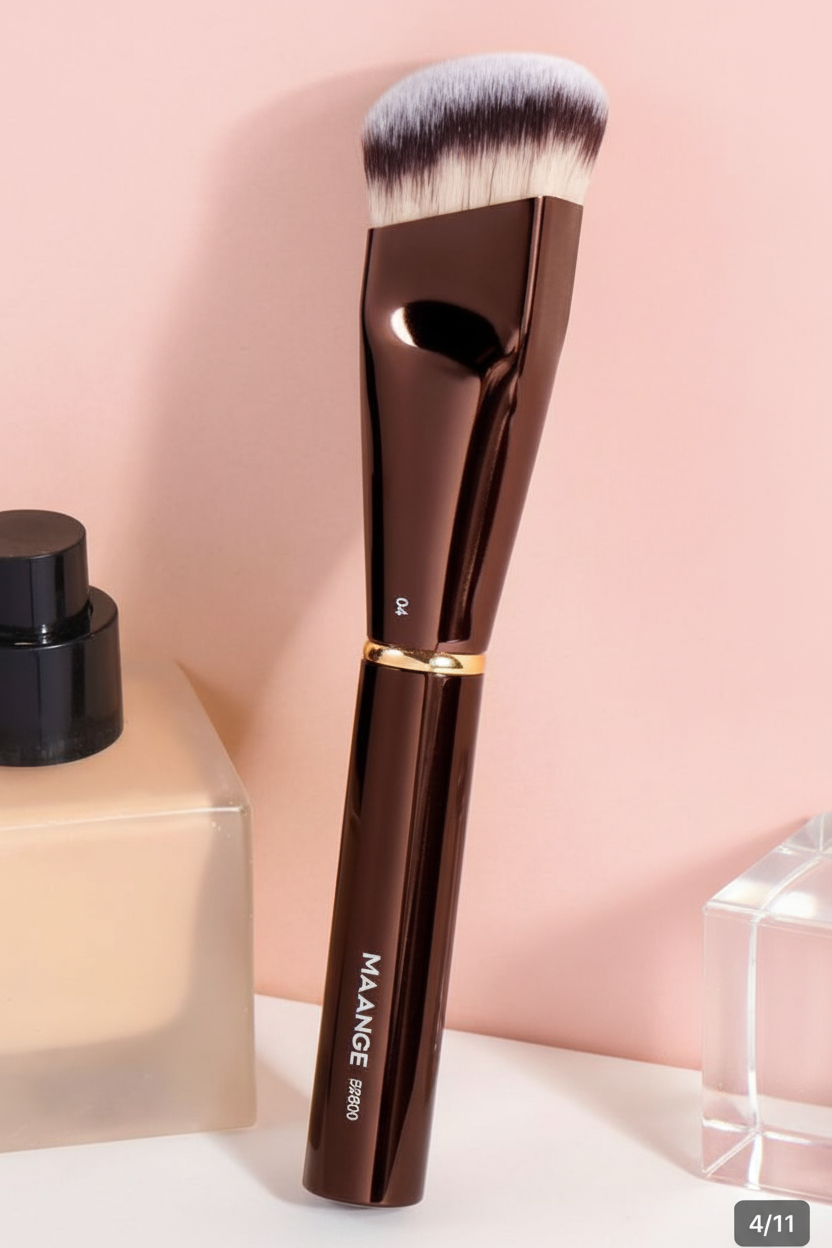 MAANGE foundation brush with pump bottle on soft pink background