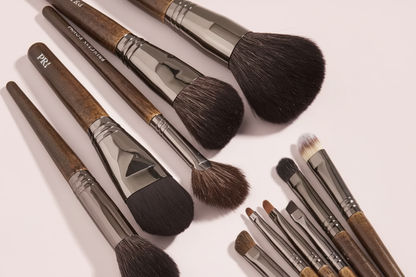 Makeup brushes with light pink background